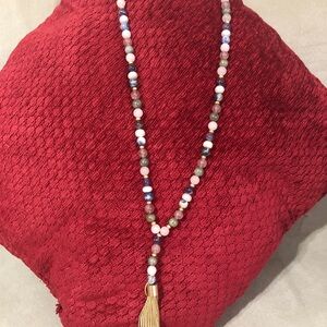 Beaded necklace with tassel